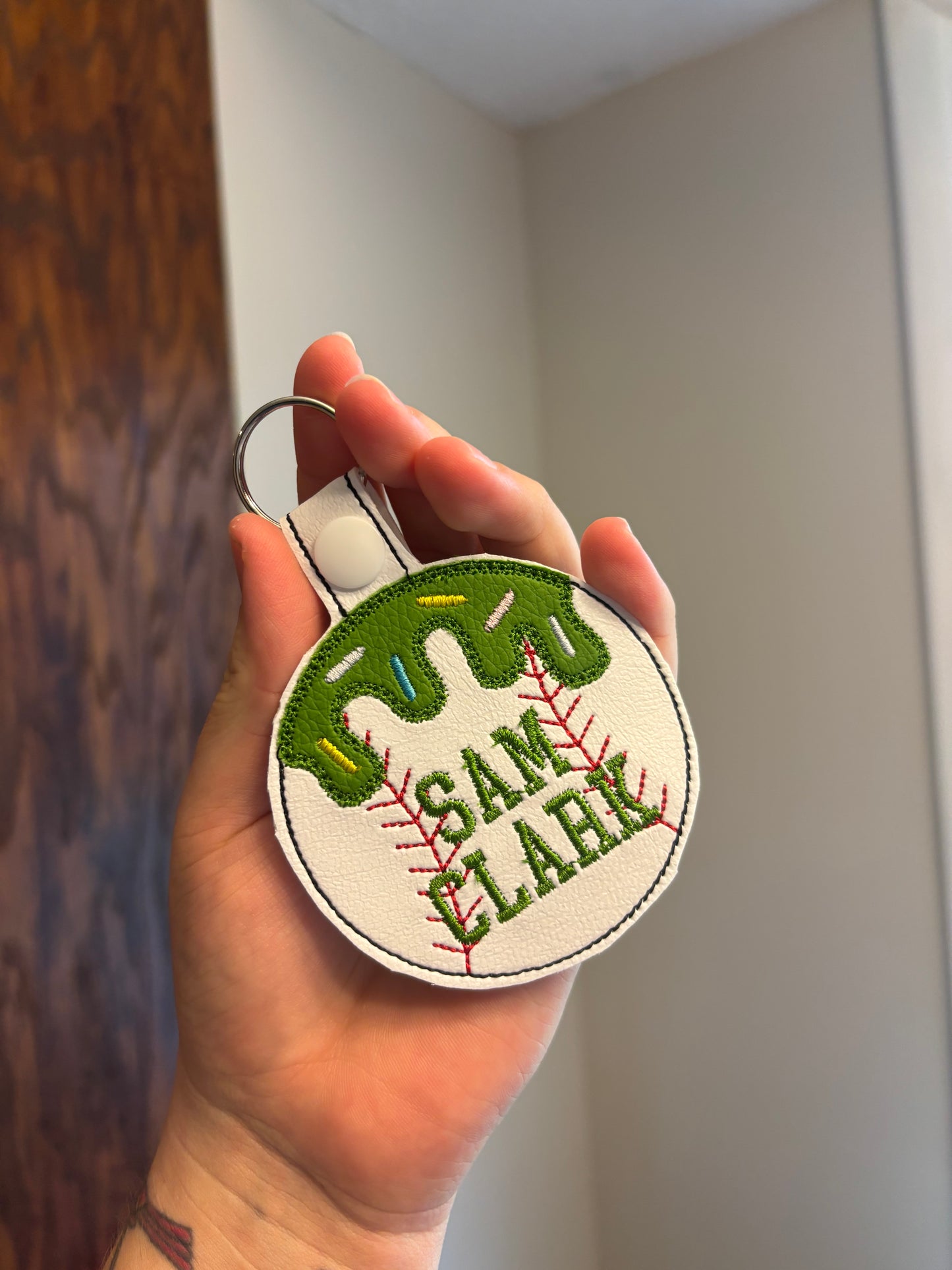 Embroidered drip sport bag tag