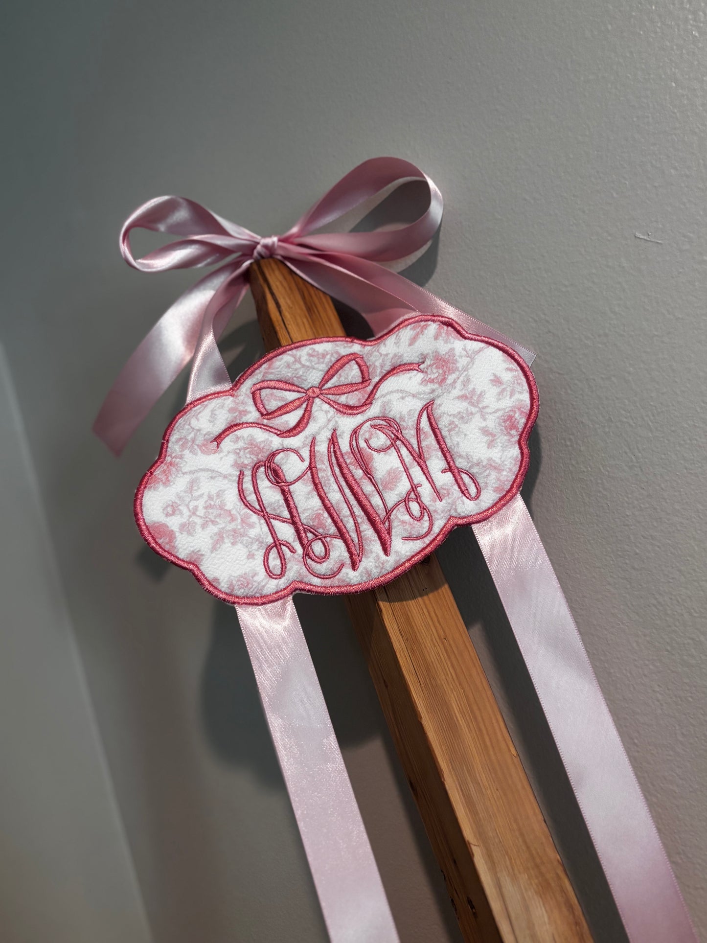 Custom embroidered bow holders